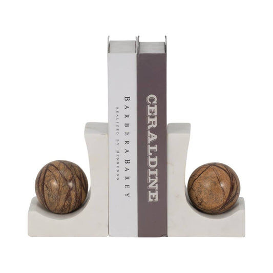 White marble bookends topped with brown marble spheres holding two books