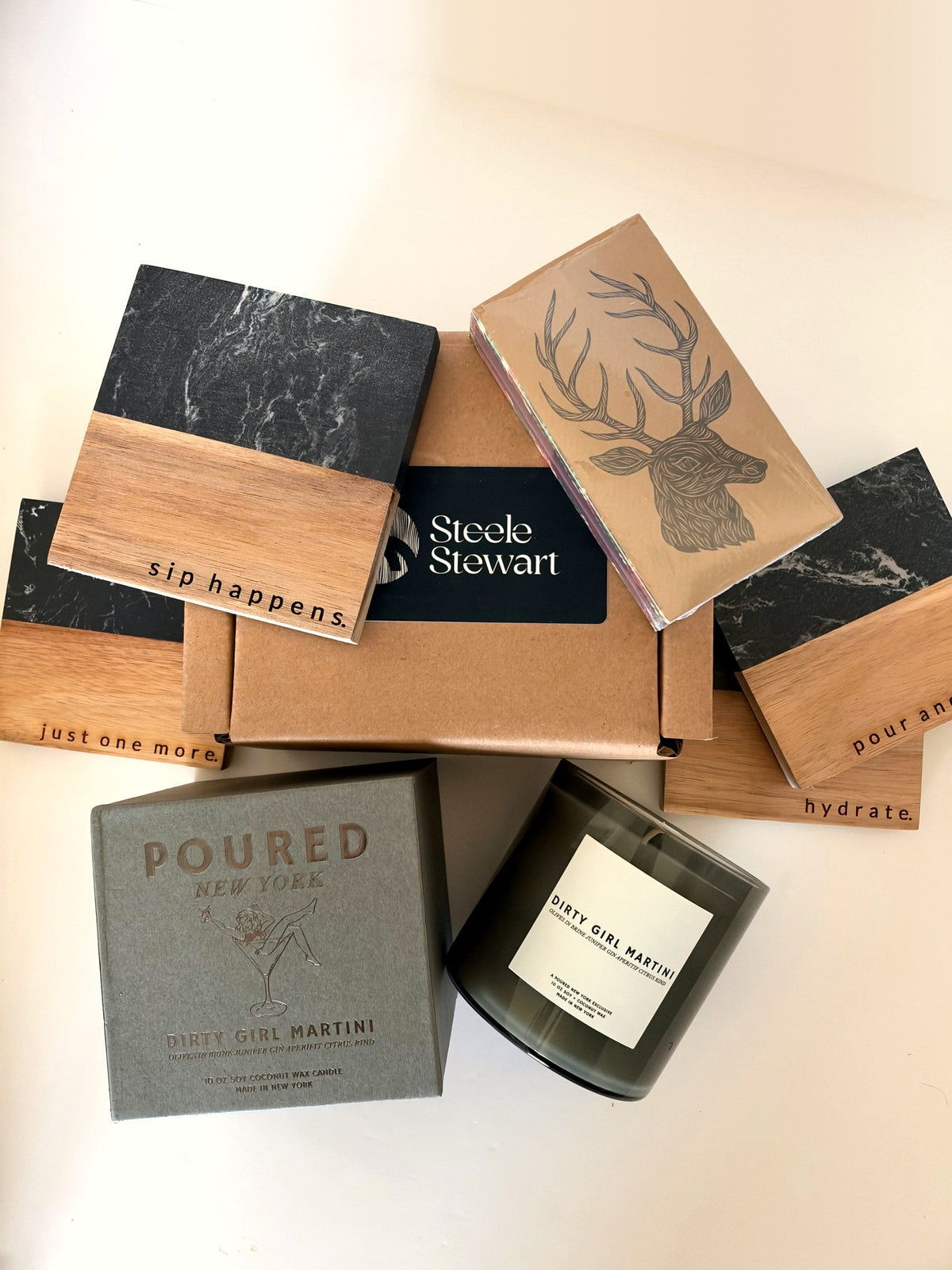 Bar Cart gift set: four engraved black marble and wood bar cart coasters, Dirty Girl Martini candle with box, woodland stag safety matches and Steele Stewart gift box