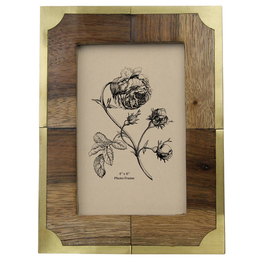 Teak wood 4x6 photo frame with brass corner accents holding a botanical print