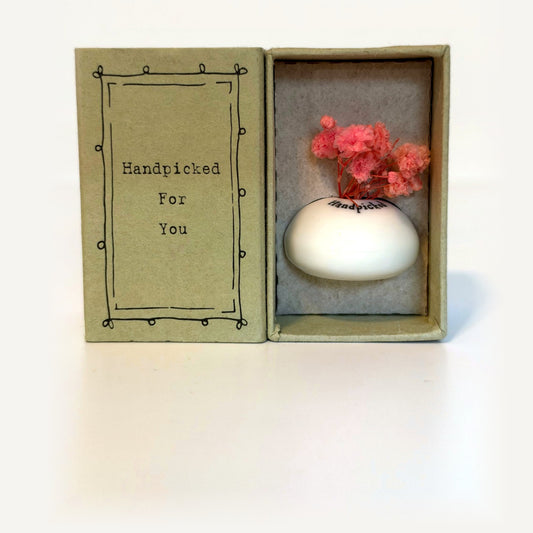 Handpicked tiny vase gift box: white porcelain vase with pink dried flowers beside a card reading Handpicked For You